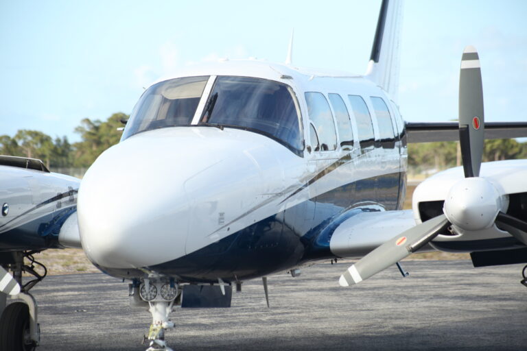 Nose and right engine of a Coastal Connections twin on the ramp